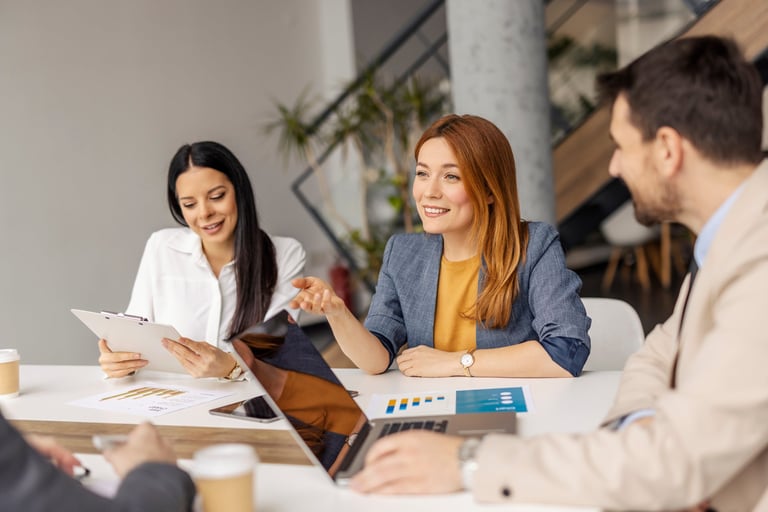 Young professionals collaborating and learning at InfinityPro